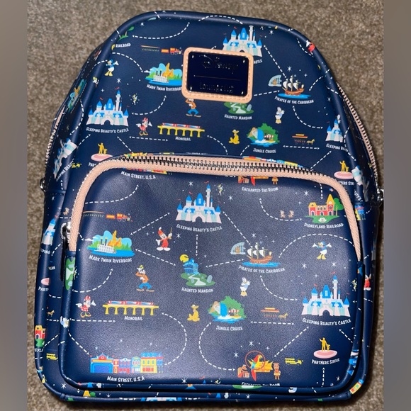 Loungefly Handbags - Like new! Loungefly Disneyland 65th anniversary backpack/crossbody bag